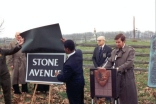 FHWA's Joseph Toole moderates as Administrator Slater and Superintendent Cisneros unveil the new sign that will replace one lost years ago.