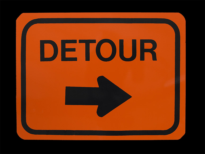 Orange detour sign.