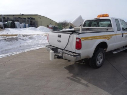 A pickup truck with road and weather equipment