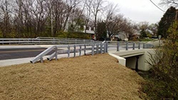 A bridge with guard railings.