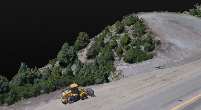 3D model of project site, which gives a photorealistic image of the existing roadway, shoulder, and hillside next to shoulder.