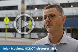 Clickable button image with picture of man being interviewed. Text states, "Brian Mayhew, NDCOT discusses STEP."