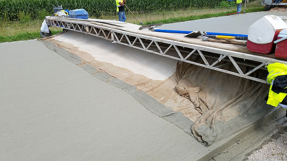 Installation of a fiber-reinforced concrete overlay.