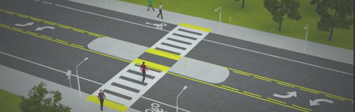 Image depicts pedestrians in crosswalk.