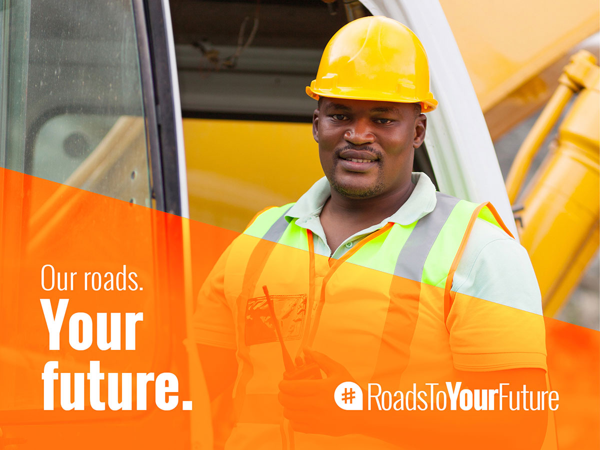 Man with hardhat standing next to heavy equipment with overlaid text, "Our roads. Your future."