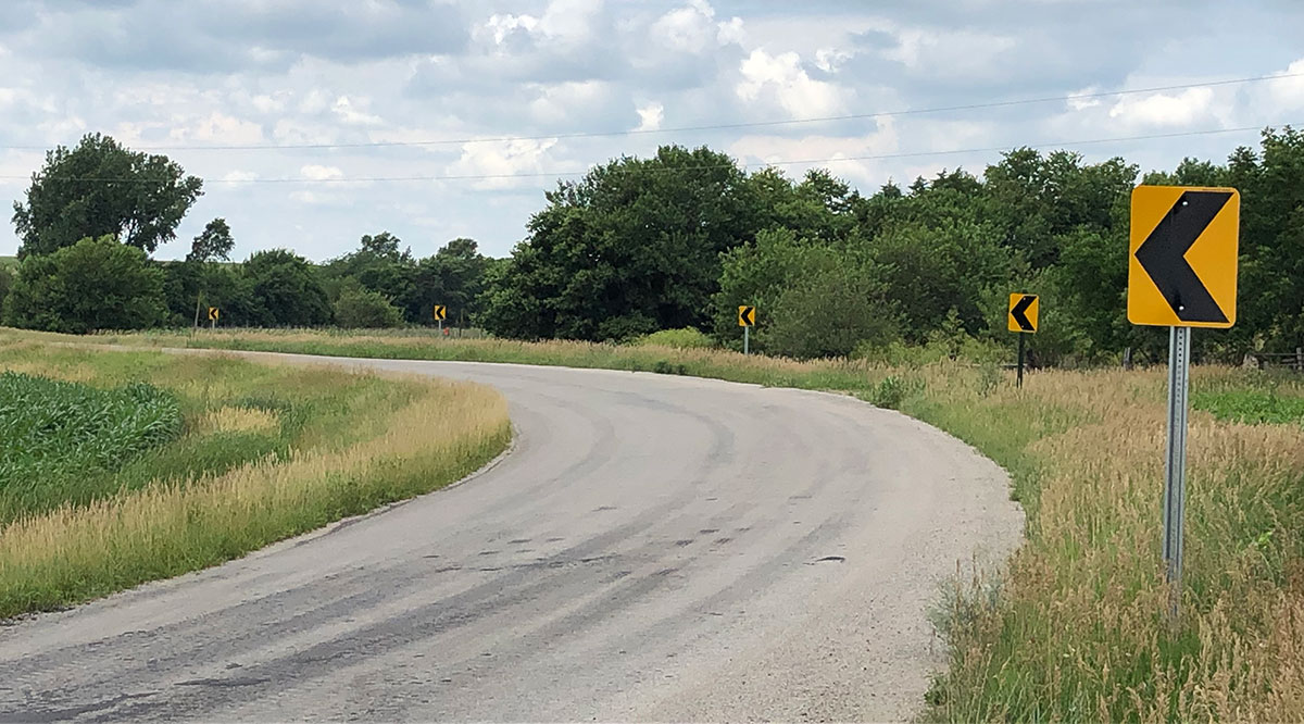 Rural horizontal curve with signing improvements.