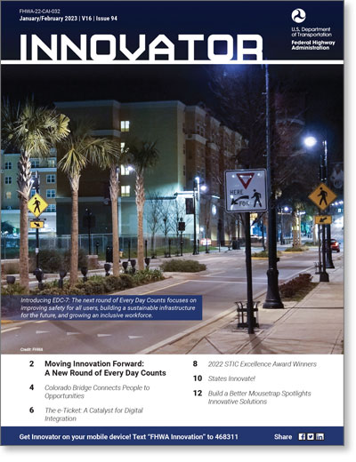Innovator Issue 94 cover image. Lighted pedestrian crossings on a downtown street.