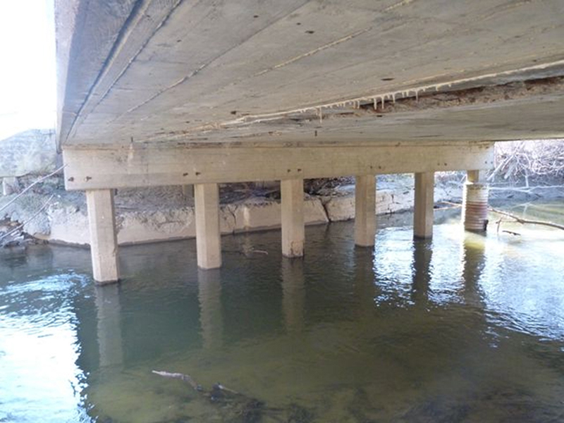 Photo of typical reinforced concrete slab bridge from the 1940s-50s era