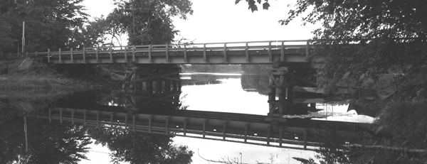 The aging Boom Birch Bridge in Maine was replaced with three precast spans, saving months from the schedule with cast-in- place construction.