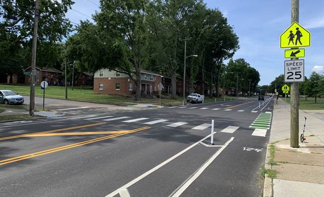 Neighborhood with separated bike paths along road