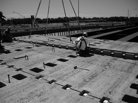 Innovations such as full-depth precast deck panels  helped the Iowa DOT save time and money on an interchange project.