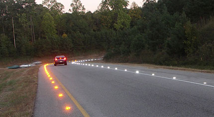 LED raised pavement markers, a safety technology undergoing a Technology Partnerships study, are designed to increase the visibility of roadway curves so drivers can navigate them more easily.