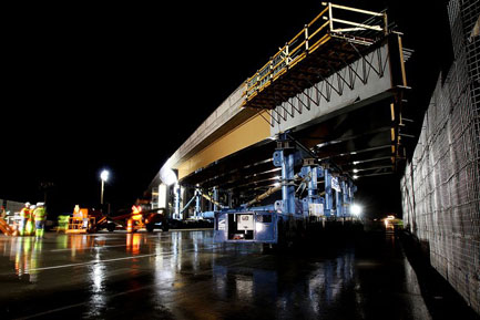 Bridge nears its final destination over I-15.