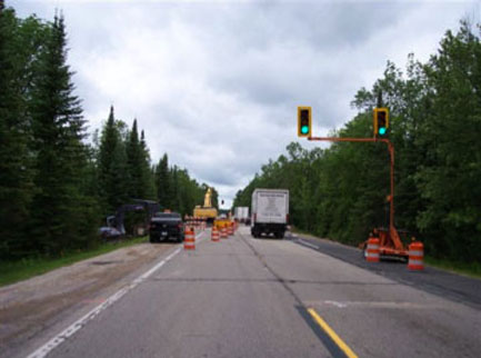 The contractor on a Michigan Highways for LIFE project opted to use self-adjusting temporary traffic signals to minimize motorist delay during construction.