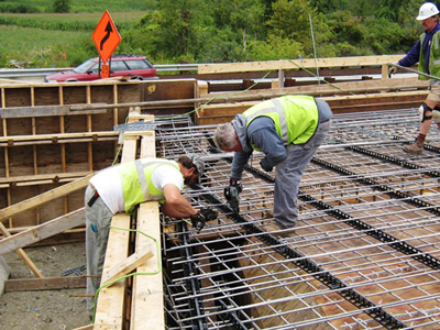 Crews used stainless steel rebar to reinforce a bridge superstructure
        on a Highways for LIFE project in Vermont.