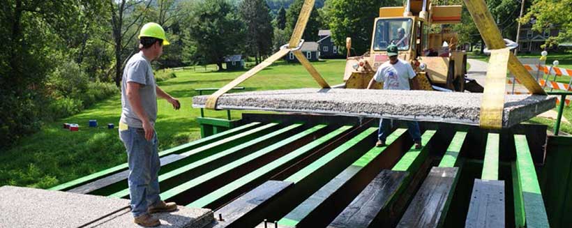 Lightweight, corrosion-resistant composite bridge
        decking was tested on a project in New York.