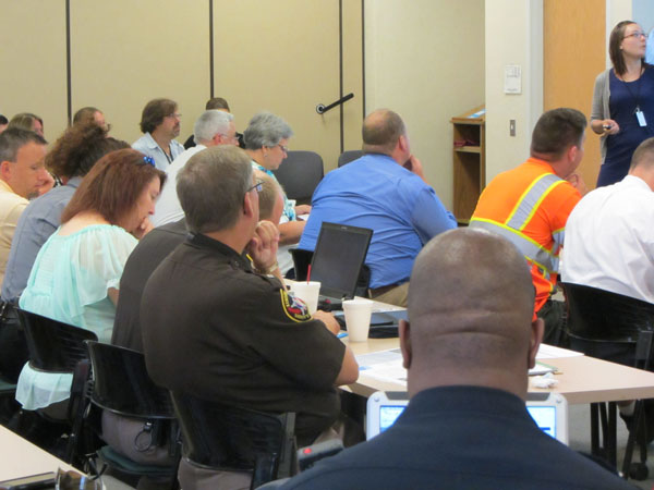 Regional TIME meeting participants review incidents and share ideas.