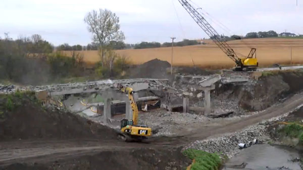 The Iowa DOT, which received AID Demonstration funds for an innovative bridge project, used accelerated bridge construction when it replaced the Keg Creek Bridge.