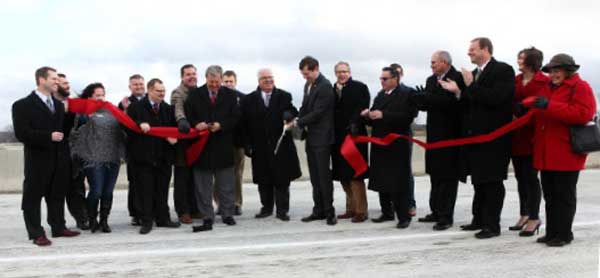 Officials cut the ribbon to open Iowa’s first diverging diamond interchange.
