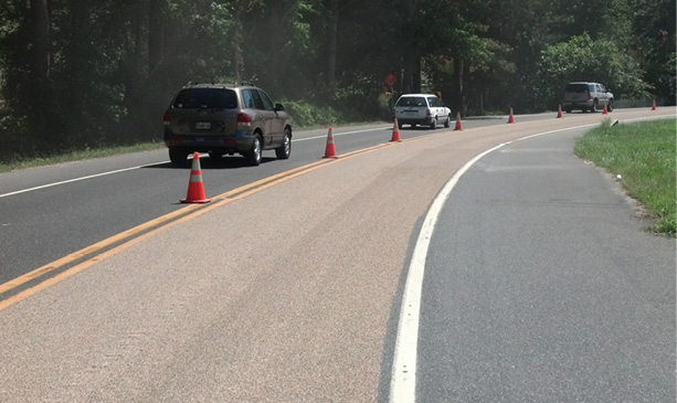 A section of high-friction surface treatment applied in Delaware cures before the road is opened to traffic. Credit: Delaware Department of Transportation
