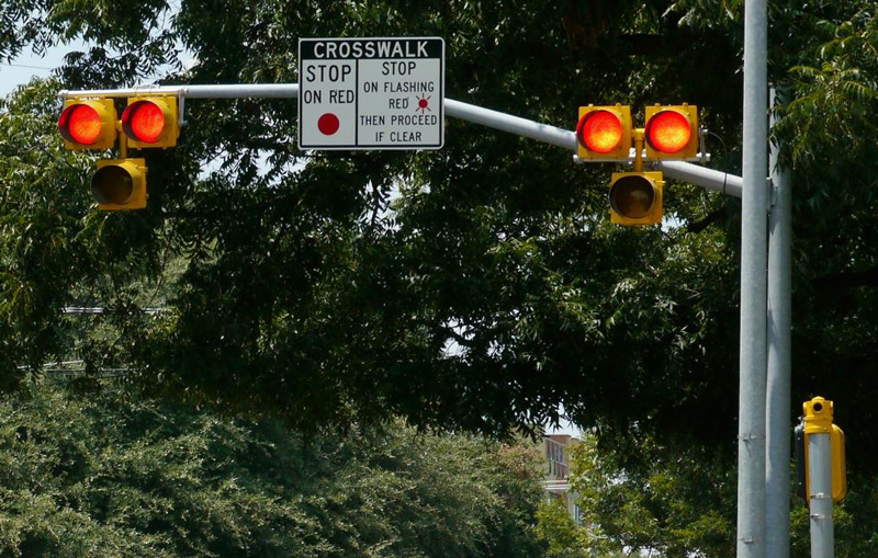 Photo of a pedestrian hybrid beacon, a safety countermeasure in the EDC-4 STEP program, alerts drivers to the presence of pedestrians in a crosswalk.