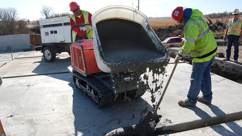 Photo of workers pouring a UHPC connection.