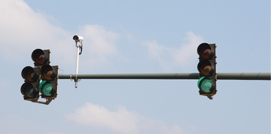 Photo of hanging traffic signals.