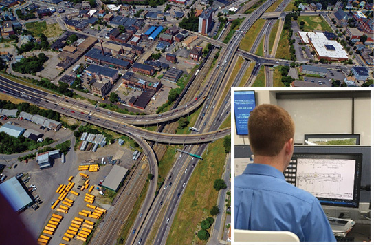 Route 6/10 interchange. Overlay with man reviewing a document on a computer screen.