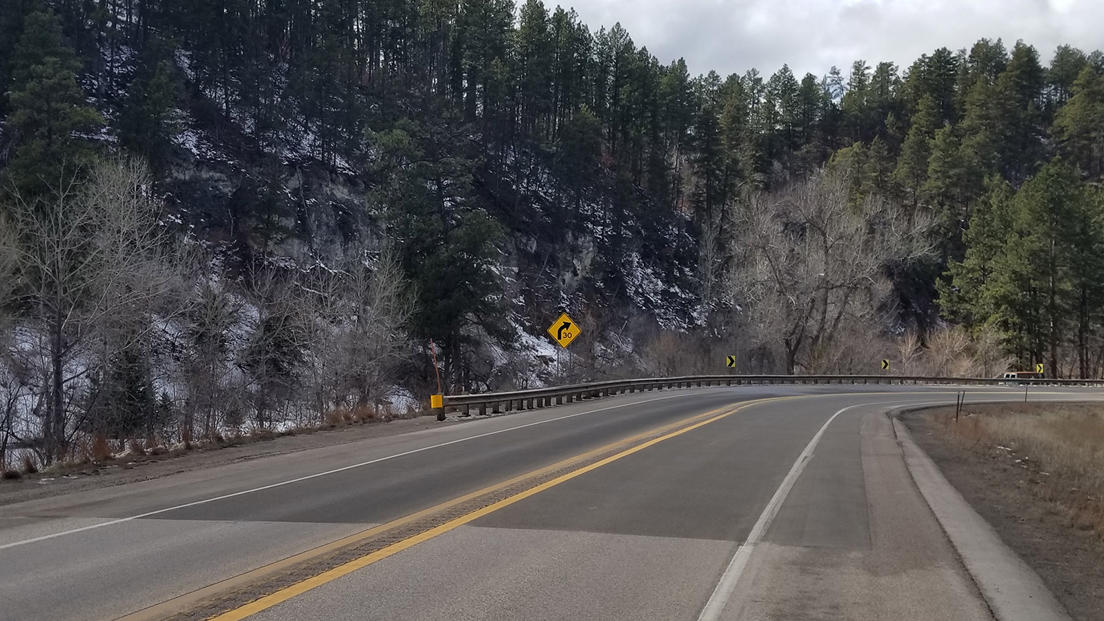 Photo of high-friction surface treatment applied at a horizontal curve on U.S. 14A near Sturgis, South Dakota.