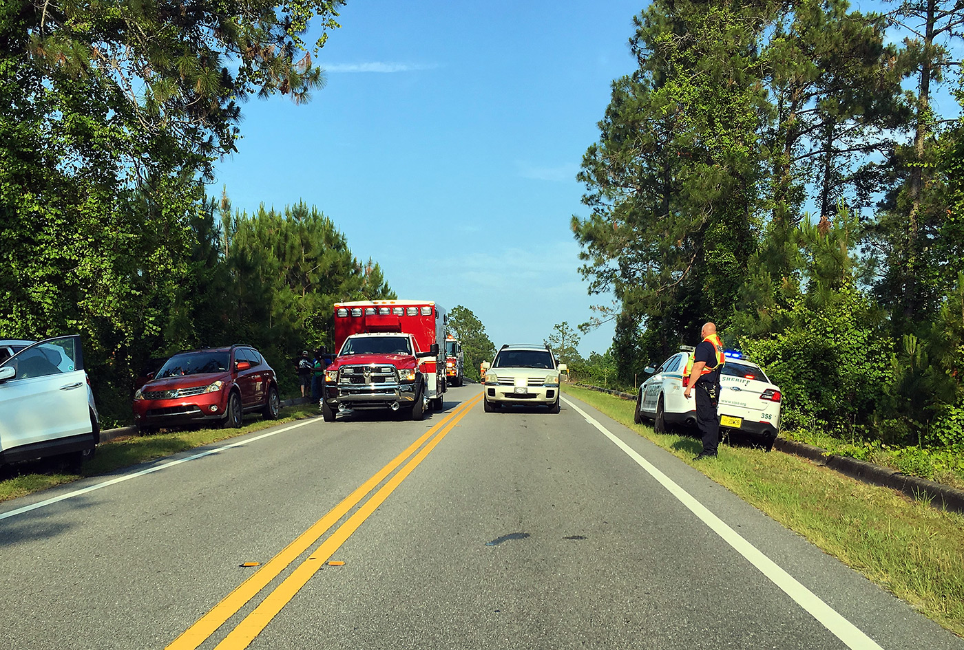 Photo of responders on the scene of a local roadway incident.