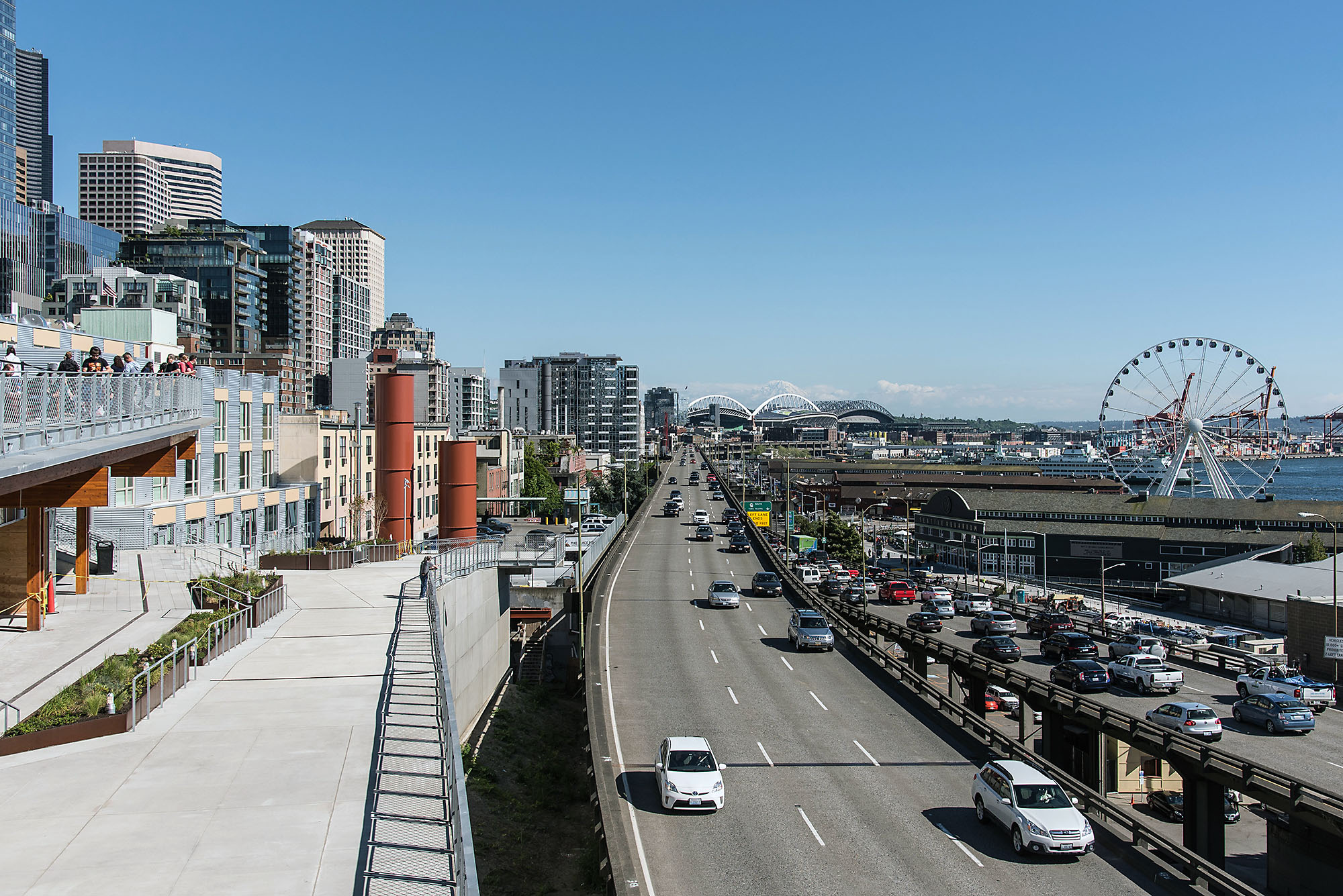 Scenic view of Seattle. Mountains and ferris wheel in the background. 