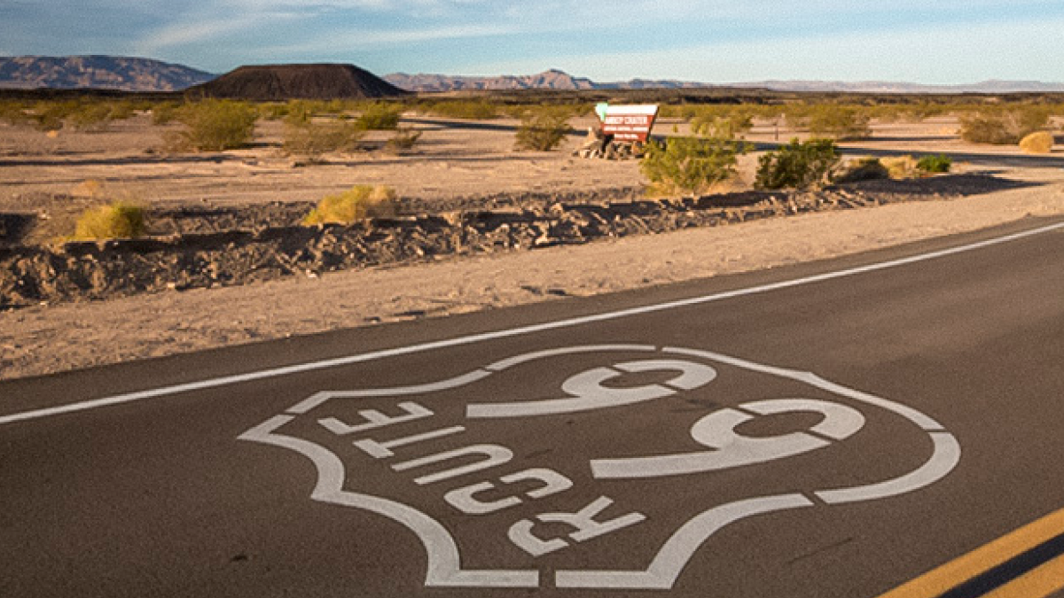 The Route 66 shield on the highway near the desert town of Amboy, California.