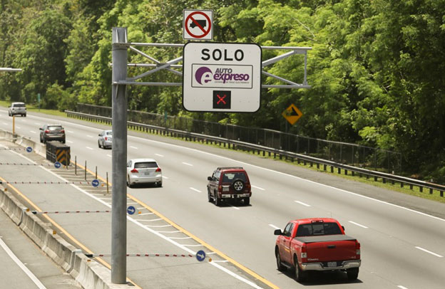 Motorist traveling on a toll highway in Puerto Rico