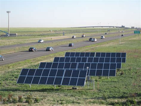 Solar panels alongside the E-470 public highway