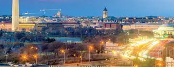 Time elapsed view of DC at night including Washington Monument.