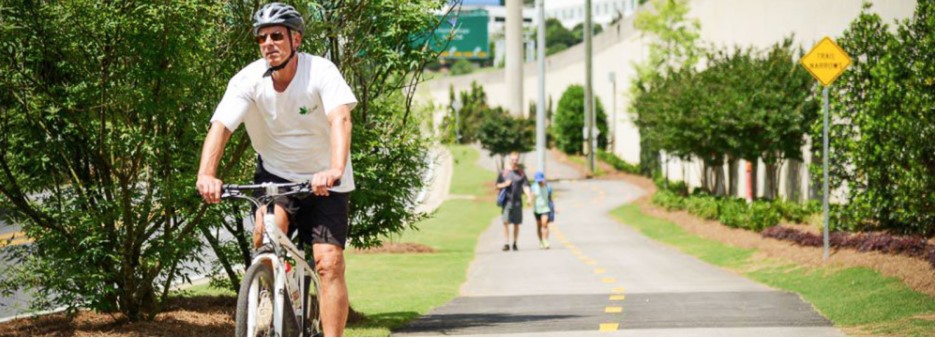 Pedestrians and cyclist on trail.