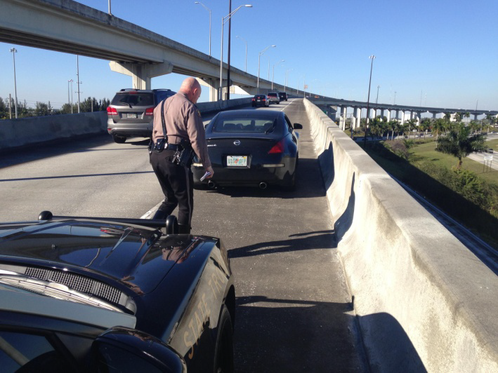 Officer approaching vehicle