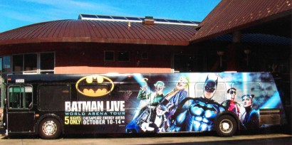 Bus with Batman Live exterior advertising.