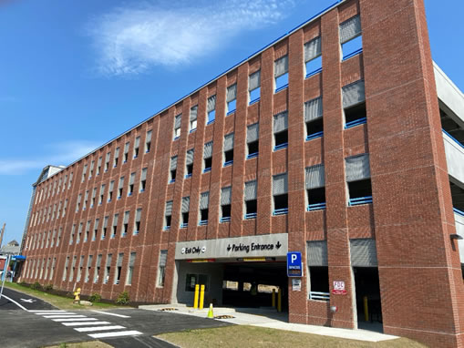 The vehicle entrance to the completed parking garage