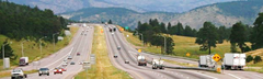 Photo of 6 lane highway with central grass median