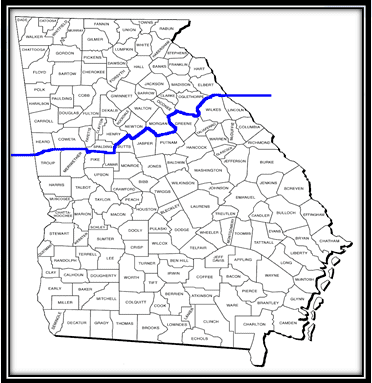 To the right of the table is a box and inside the box, a map of the State of Georgia appears. All counties of Georgia are shown on the map. A blue line separates approximately the top one-third of the State from the bottom two thirds. The line runs along the southern edges of the following counties: Elbert, Oglethorpe, Oconee, Morgan, Newton, Henry, Spalding, Coweta, and Heard. The counties above the blue line are treated with de-icing chemicals in the winter. The counties below the blue line do not receive de-icing chemicals in the winter.