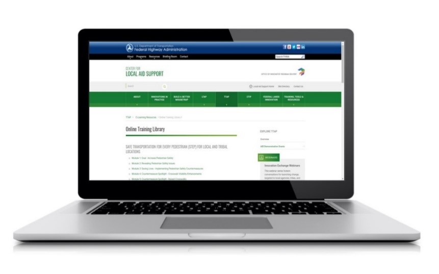a laptop with an e-learning course on screen