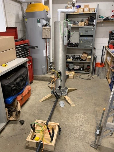 A roadway electric training system inside a workshop.