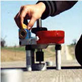 Tensile bond strength testing of a bonded over asphalt overlay