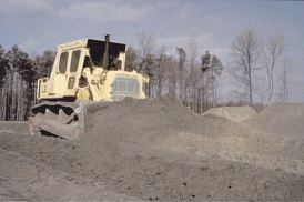 Figure 6-3: Spreading and compaction of fly ash structural fill.