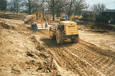 Figure 7-3: Mixing and compaction of fly ash into a plastic soil.