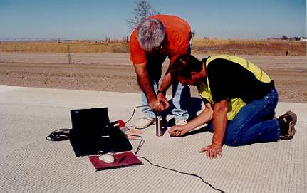 Photo of Impact Echo Test being conducted