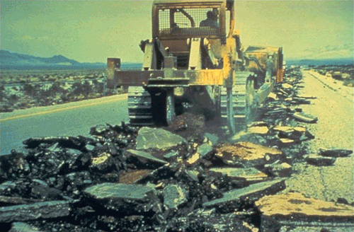 Figure 5-6. Dozer with rear-mounted ripper tooth.