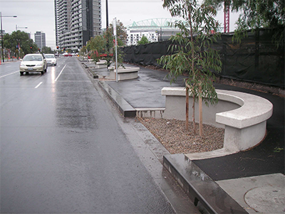 Trees planted inside curved seating.