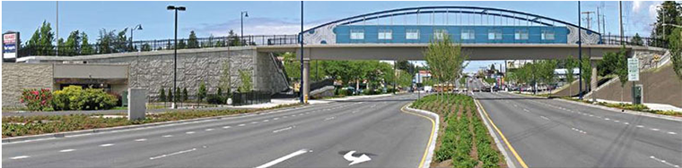 Bridge over four-lane divided road.